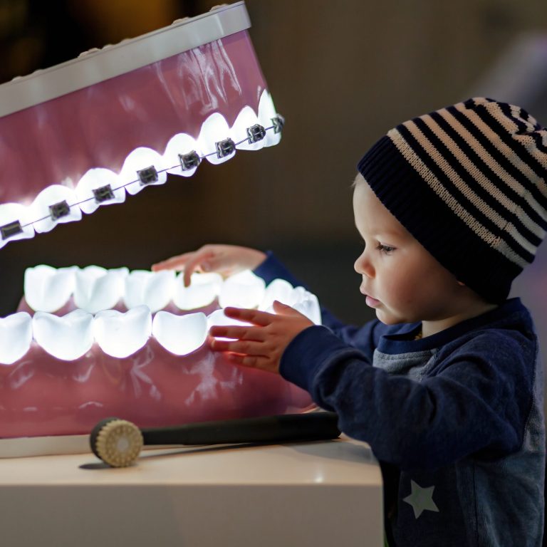 in-an-interactive-museum-the-boy-studying-the-str-2026-03-16-23-52-05-utc